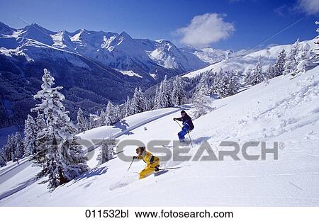 couple skiing in winter landscape View Large Photo Image Stock Image - couple skiing in winter landscape. Fotosearch