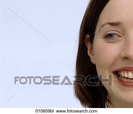Detail of a smiling young woman View Large Photo Image Stock Image - Detail of a smiling young woman. Fotosearch