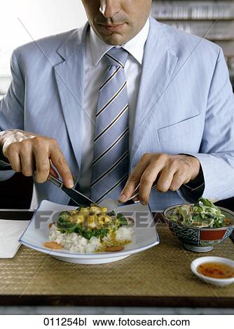 detail of businessman having asian food for lunch View Large Photo Image Stock Image - detail of businessman having asian food for lunch. Fotosearch