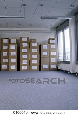 empty office space with moving boxes in the background View Large Photo Image Stock Image - empty office space with moving boxes in the background. Fotosearch