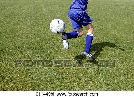 Stock Image - football player doing the backheel trick. Fotosearch