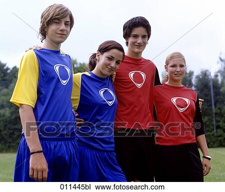 group of friends posing in football dresses View Large Photo Image Stock Image - group of friends posing in football dresses. Fotosearch