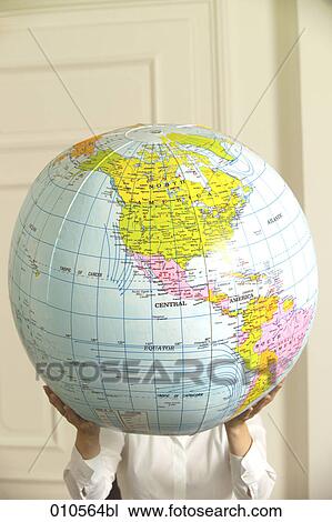 hands holding an inflatable globe View Large Photo Image Stock Image - hands holding an inflatable globe. Fotosearch