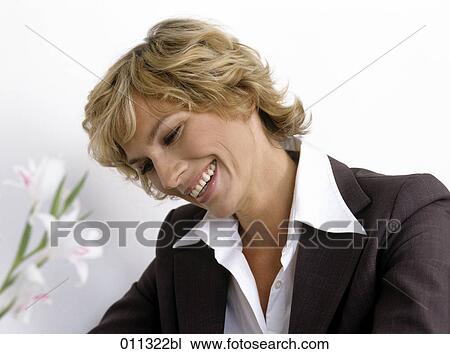 Stock Image - laughing businesswoman. Fotosearch
