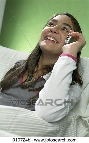 laughing girl talking on mobile phone View Large Photo Image Stock Image - laughing girl talking on mobile phone. Fotosearch