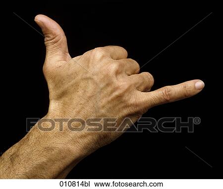 Stock Image - Male hand doing the telephone sign. Fotosearch