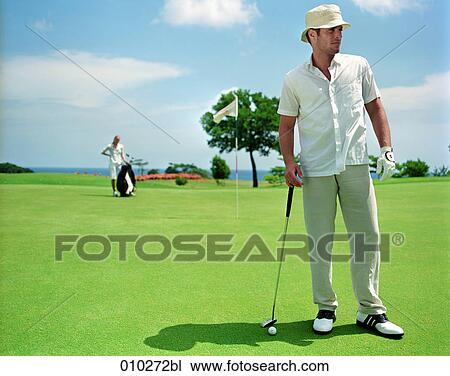 man (30-35 years) on golf course View Large Photo Image Stock Image - man (30-35 years) on golf course . Fotosearch