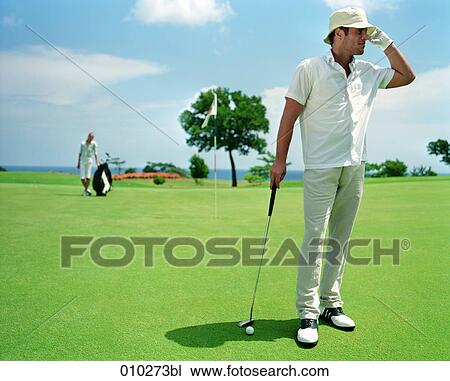 man (30-35 years) on golf course View Large Photo Image Stock Image - man (30-35 years) on golf course . Fotosearch