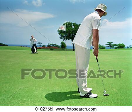 man (30-35 years) on golf course View Large Photo Image Stock Image - man (30-35 years) on golf course . Fotosearch