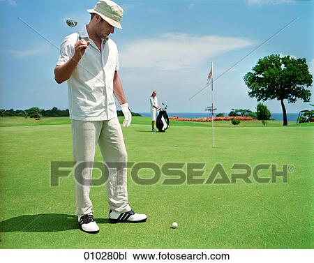 man (30-35 years) on golf course View Large Photo Image Stock Image - man (30-35 years) on golf course . Fotosearch