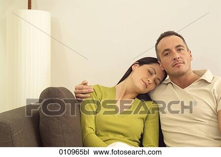 Man embracing woman sleeping in his arms View Large Photo Image Stock Image - Man embracing woman sleeping in his arms. Fotosearch