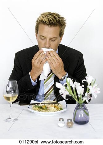 man in suit using a napkin in restaurant View Large Photo Image Stock Image - man in suit using a napkin in restaurant. Fotosearch
