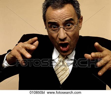 Mature businessman gesturing wildly View Large Photo Image Stock Image - Mature businessman gesturing wildly. Fotosearch