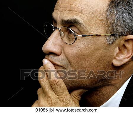 Mature businessman with thoughtful expression View Large Photo Image Stock Image - Mature businessman with thoughtful expression. Fotosearch