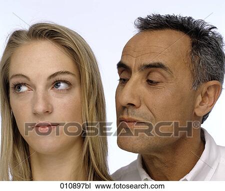 Stock Image - mature man and young woman mating. Fotosearch