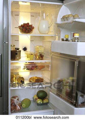open refrigerator filled with various foods View Large Photo Image Stock Image - open refrigerator filled with various foods. Fotosearch