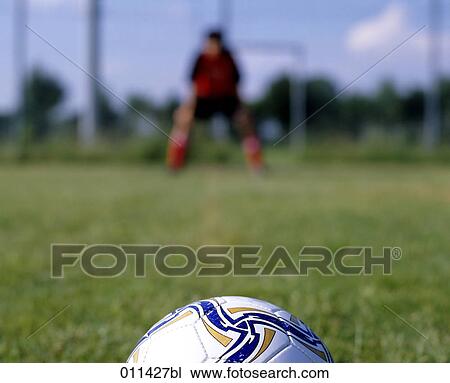 Stock Image - penalty situation during football game. Fotosearch