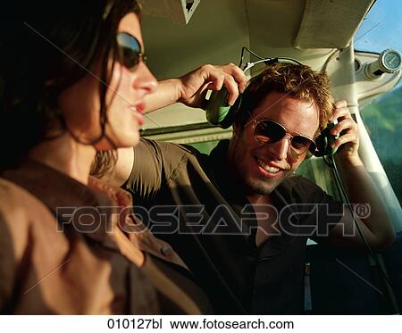 pilot of small propeller plane flirting with passenger View Large Photo Image Stock Image - pilot of small propeller plane flirting with passenger. Fotosearch