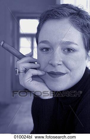 portrait of a young woman with cigar, monochrome View Large Photo Image Stock Image - portrait of a young woman with cigar, monochrome. Fotosearch