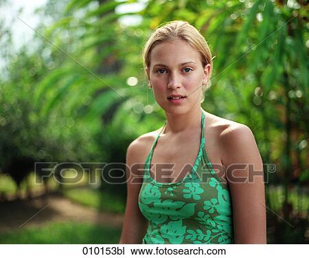 Stock Image - portrait of blonde, smiling teenage woman. Fotosearch