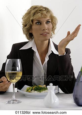 portrait of businesswoman eating asian food View Large Photo Image Stock Image - portrait of businesswoman eating asian food. Fotosearch