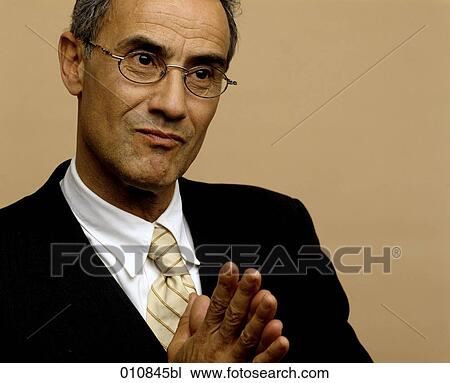 Portrait of concentrated looking businessman View Large Photo Image Stock Image - Portrait of concentrated looking businessman. Fotosearch