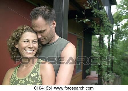 portrait of couple in their garden View Large Photo Image Stock Image - portrait of couple in their garden. Fotosearch