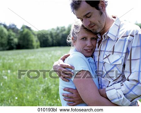 portrait of couple outside in the park View Large Photo Image Stock Image - portrait of couple outside in the park. Fotosearch