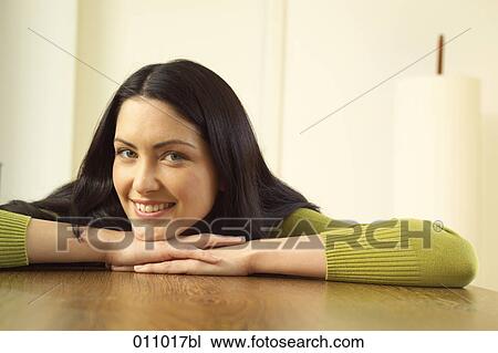 Portrait of dark haired young woman View Large Photo Image Stock Image - Portrait of dark haired young woman. Fotosearch