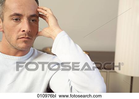 Portrait of pensive looking man in casual dress View Large Photo Image Stock Image - Portrait of pensive looking man in casual dress. Fotosearch