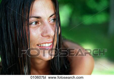 portrait of smiling woman with wet hair View Large Photo Image Stock Image - portrait of smiling woman with wet hair. Fotosearch