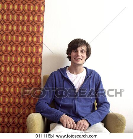 Portrait of teenage boy wearing blue jacket View Large Photo Image Stock Image - Portrait of teenage boy wearing blue jacket. Fotosearch
