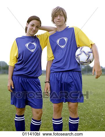 portrait of two teenagers, boy holding ball View Large Photo Image Stock Image - portrait of two teenagers, boy holding ball. Fotosearch
