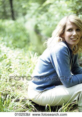 portrait of woman (35-40 years) smiling at camera View Large Photo Image Stock Image - portrait of woman (35-40 years) smiling at camera. Fotosearch