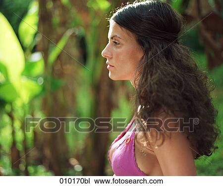 portrait of woman in bikini in tropical environment View Large Photo Image Stock Image - portrait of woman in bikini in tropical environment. Fotosearch