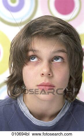portrait of young boy looking up View Large Photo Image Stock Image - portrait of young boy looking up. Fotosearch