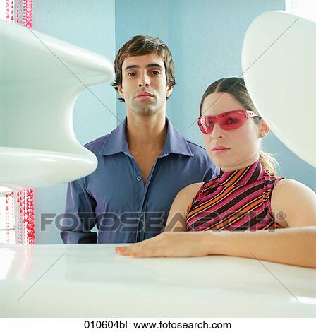 portrait of young couple surrounded by stylish decoration View Large Photo Image Stock Image - portrait of young couple surrounded by stylish decoration. Fotosearch