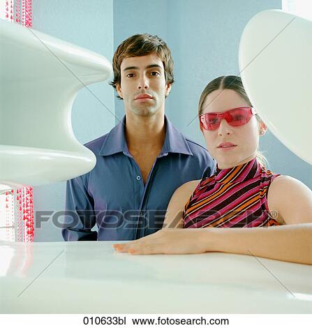 portrait of young couple surrounded by stylish objects View Large Photo Image Stock Image - portrait of young couple surrounded by stylish objects. Fotosearch