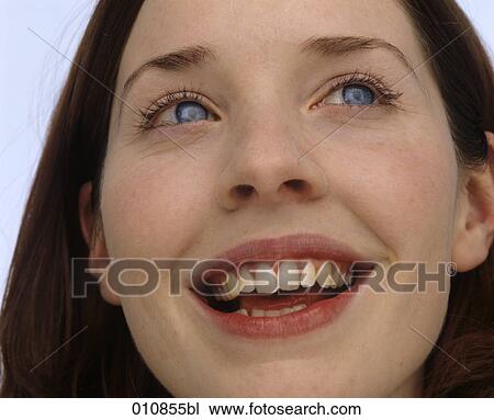 Red haired woman smiling View Large Photo Image Stock Image - Red haired woman smiling. Fotosearch