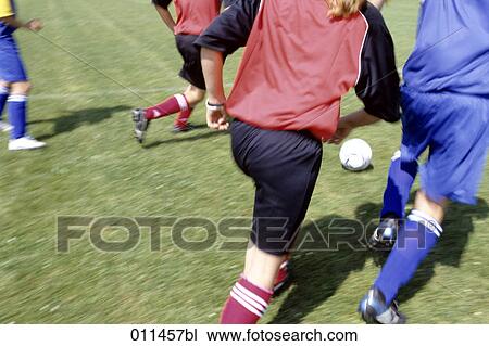 scene of teenagers playing football View Large Photo Image Stock Image - scene of teenagers playing football. Fotosearch