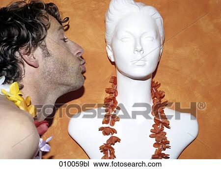 side portrait of male caucasian kissing a mannequin doll View Large Photo Image Stock Image - side portrait of male caucasian kissing a mannequin doll. Fotosearch