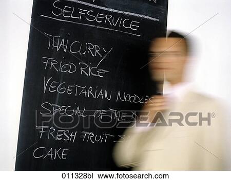 slate with menu of day in a restaurant, businessman passing by View Large Photo Image Stock Image - slate with menu of day in a restaurant, businessman passing by. Fotosearch