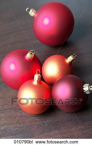 still life of christmas baubles on dark background View Large Photo Image Stock Image - still life of christmas baubles on dark background. Fotosearch