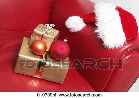 Stock Image - still life of christmas presents and decoration objects. Fotosearch