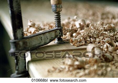 still life of hand-vice, wooden planks and slivers View Large Photo Image Stock Image - still life of hand-vice, wooden planks and slivers. Fotosearch