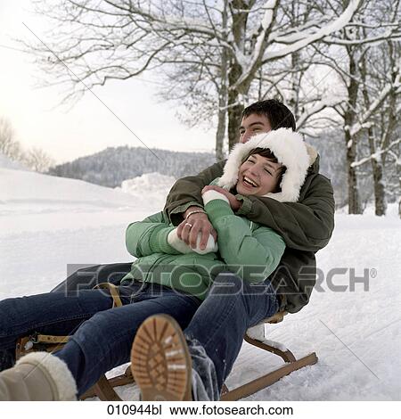 teenage couple enjoying a day out in the snow View Large Photo Image Stock Image - teenage couple enjoying a day out in the snow. Fotosearch