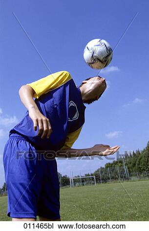 teenage footballer doing header View Large Photo Image Stock Image - teenage footballer doing header. Fotosearch