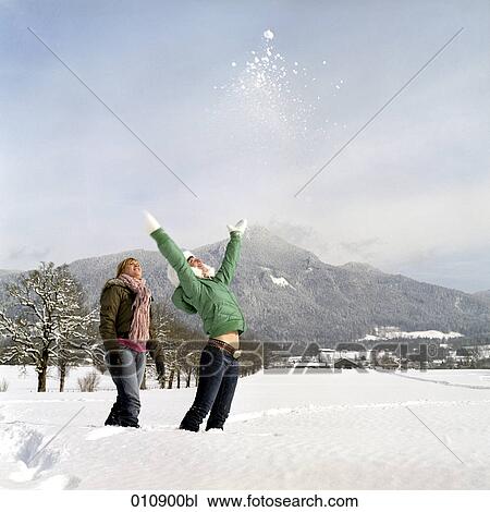 teenage girl and boy enjoying a sunny dayin the snow View Large Photo Image Stock Image - teenage girl and boy enjoying a sunny dayin the snow. Fotosearch
