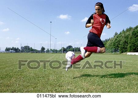 teenage girl playing the ball with the backheel View Large Photo Image Stock Image - teenage girl playing the ball with the backheel. Fotosearch