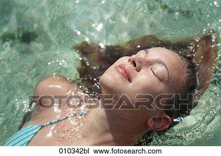 teenager (16-19 years) relaxing in the water View Large Photo Image Stock Image - teenager (16-19 years) relaxing in the water. Fotosearch